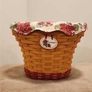 Longaberger Woven Basket with Floral Liner and oval brown basket vase.